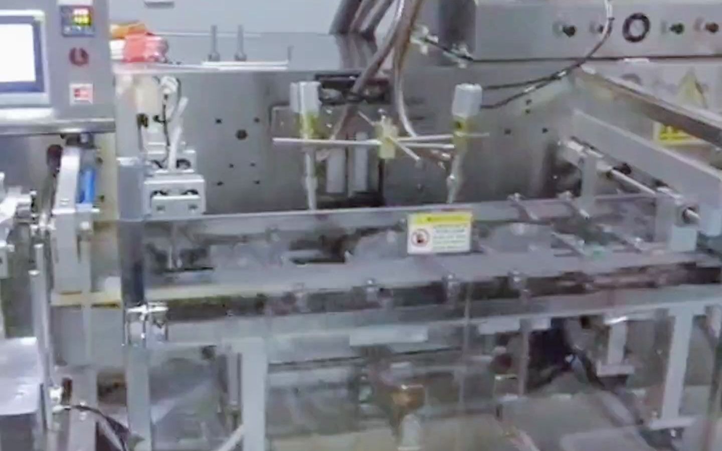 水平給袋式液體包裝機,全自動醬料包裝機設(shè)備